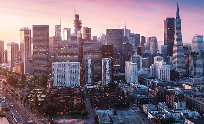 San Francisco panorama at sunrise with waterfront and downtown. California theme background. Art photograph.
